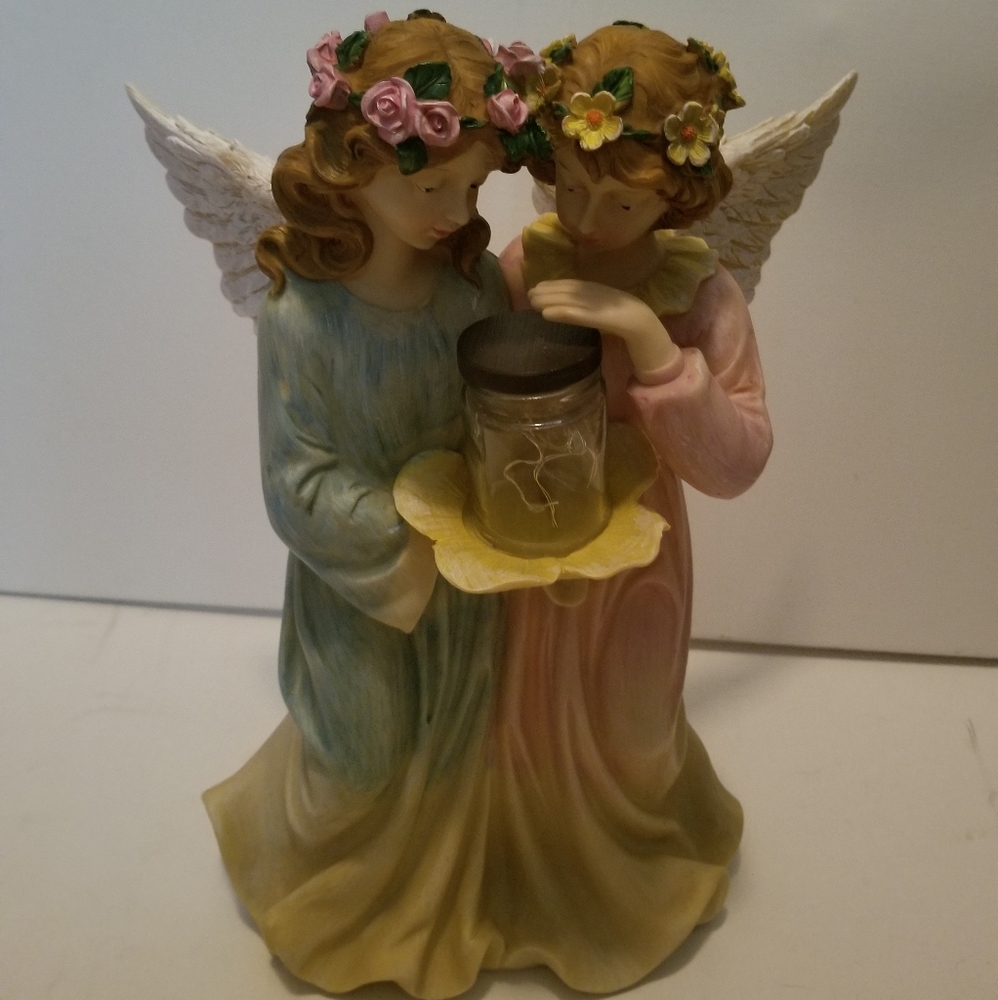 Two Winged Guided By Light Embrassed Solar Fairies